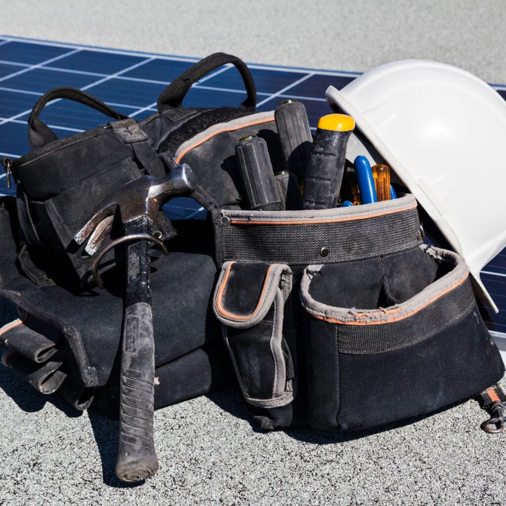 Toolkit next to solar panel to represent Solar Toolkit for Schools