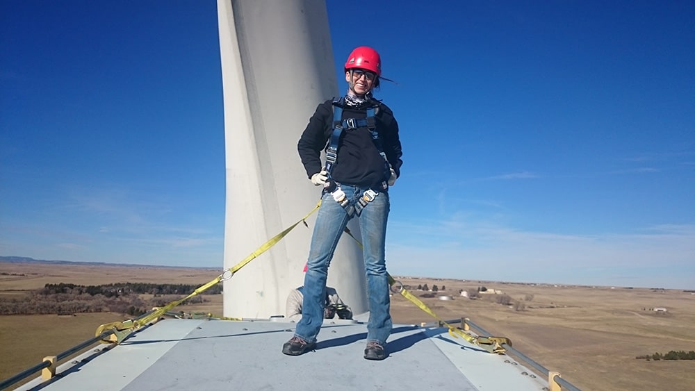 Student from Laramie Community College's Wind Energy program in the field
