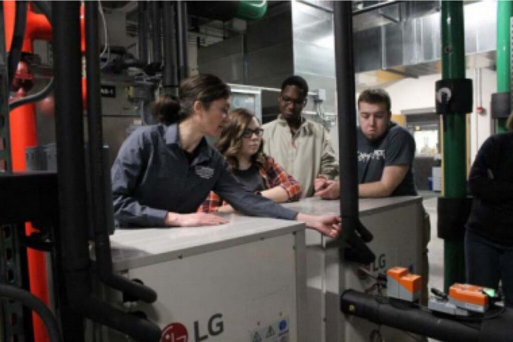 Students examining equipment at Northeast Wisconsin's Energy Management Facility