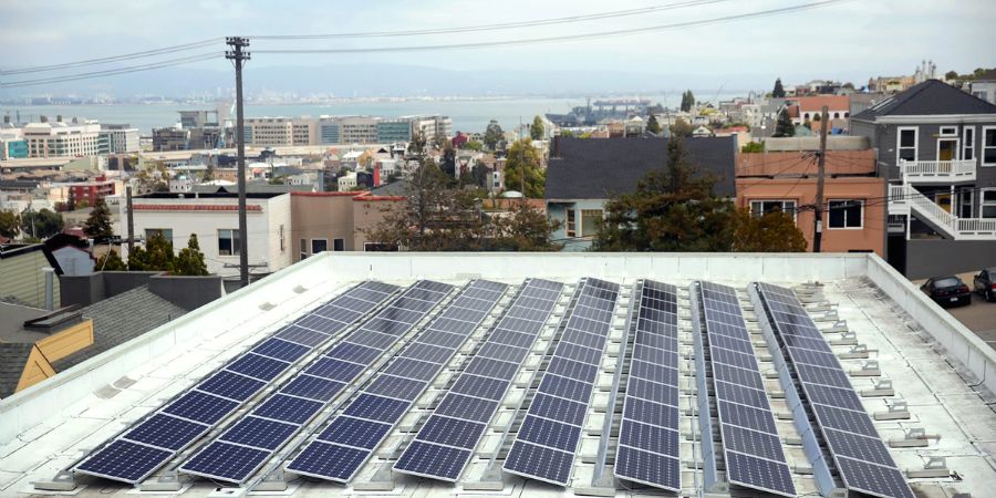 Solar panels on top of a city school