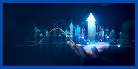 A dark background with a hand holding a city scape with arrows.