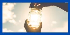 Sunshine, clouds, mason jar and hands.